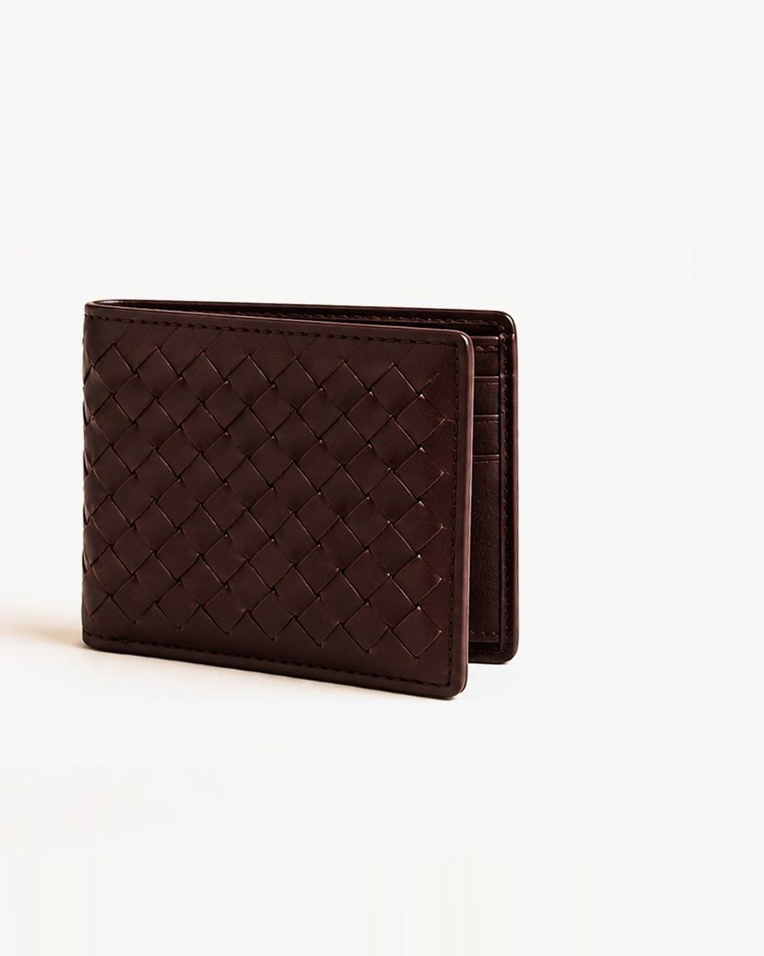 Milano woven bifold wallet — oxblood in Full-grain calfskin exterior; smooth nappa lining; burnished edges
