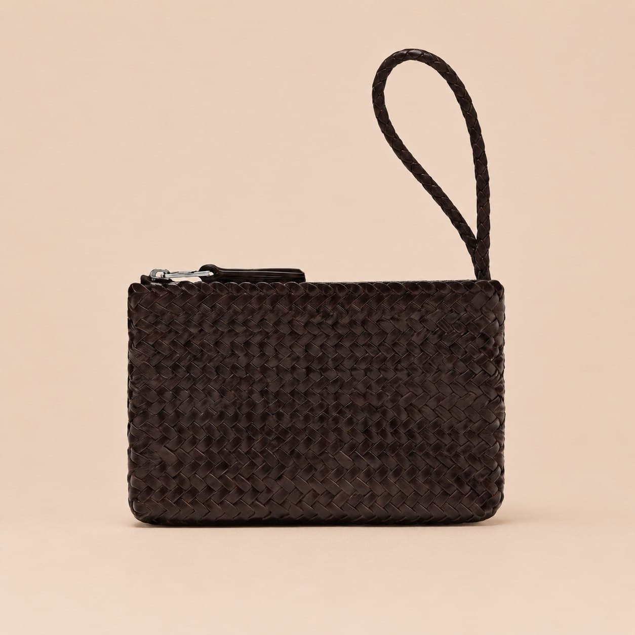 Sera wristlet clutch — dark chocolate in Full-grain vegetable-tanned leather; zip top
