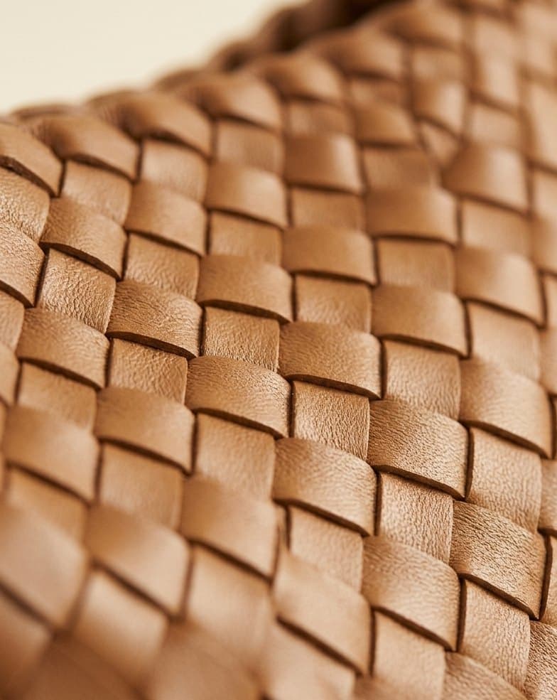 Close-up of the wide intrecciato with braided strap on the Sofia